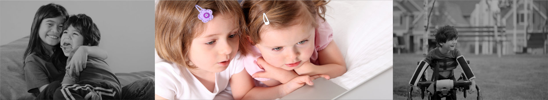 two kids using laptop