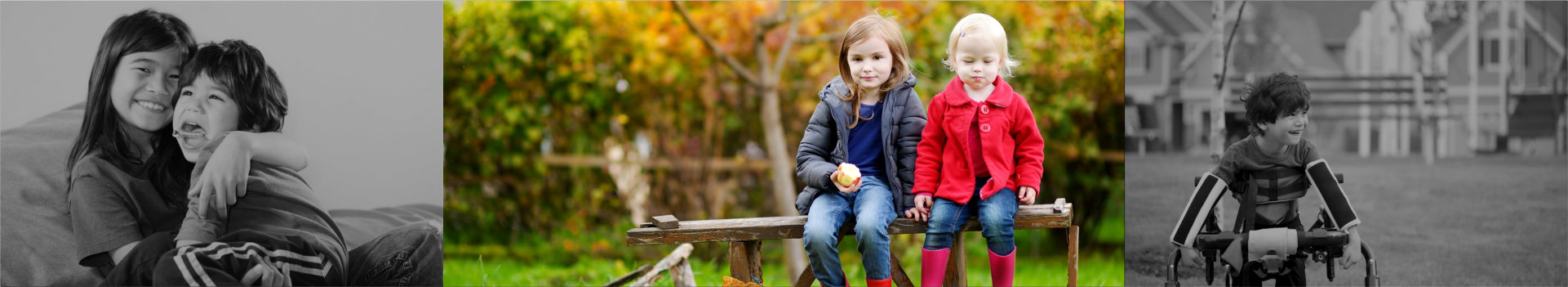 two kids sitting on a wooden bench outdoors